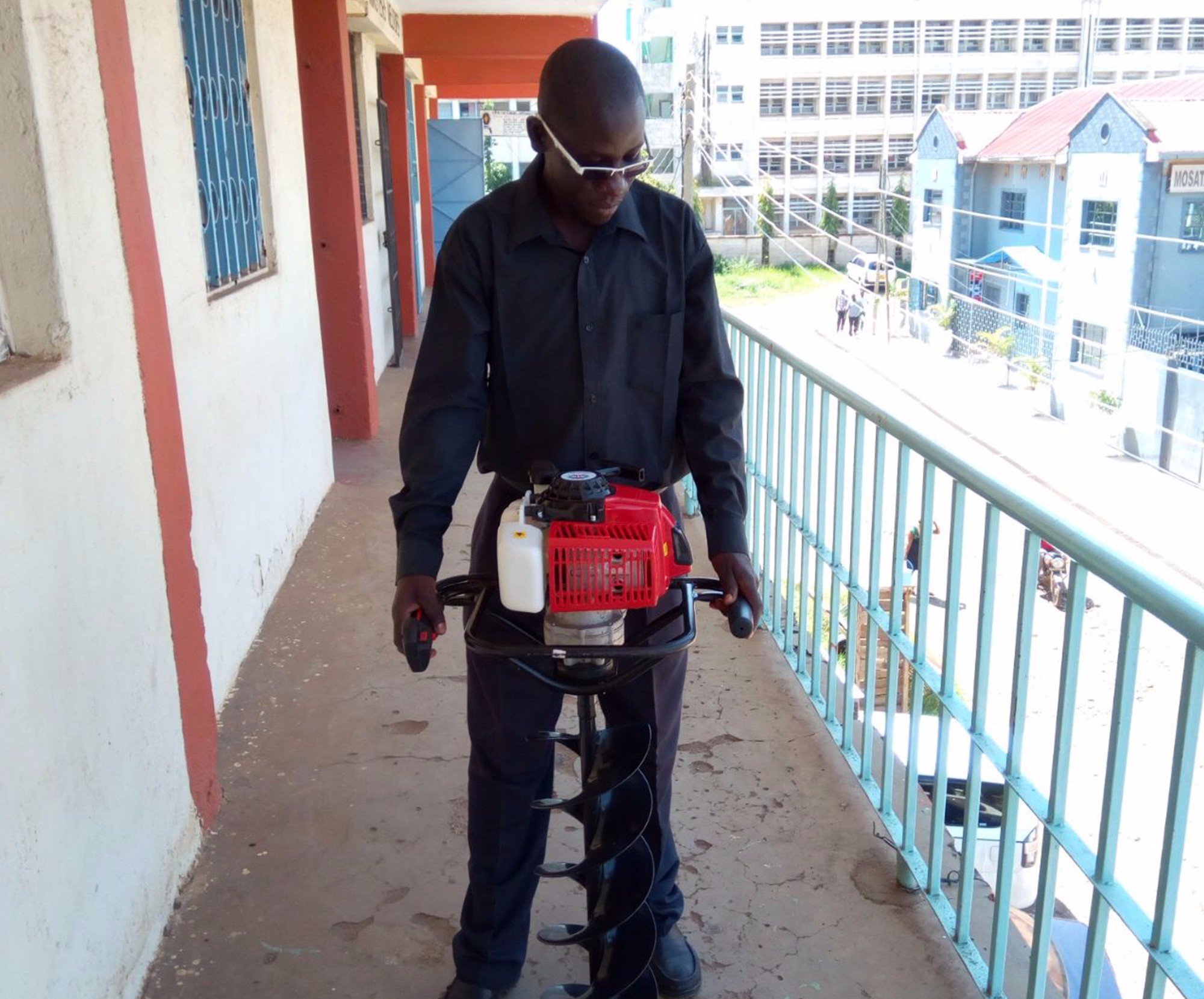 Tanzania customer with earth auger machine